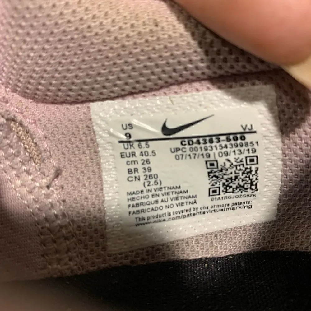 USED Nike Women's Blush Pink and Black Running Sneakers